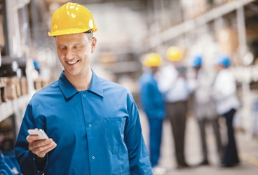 Worker with helmet using a smartphone.

Used firstly in the BOC brochure 